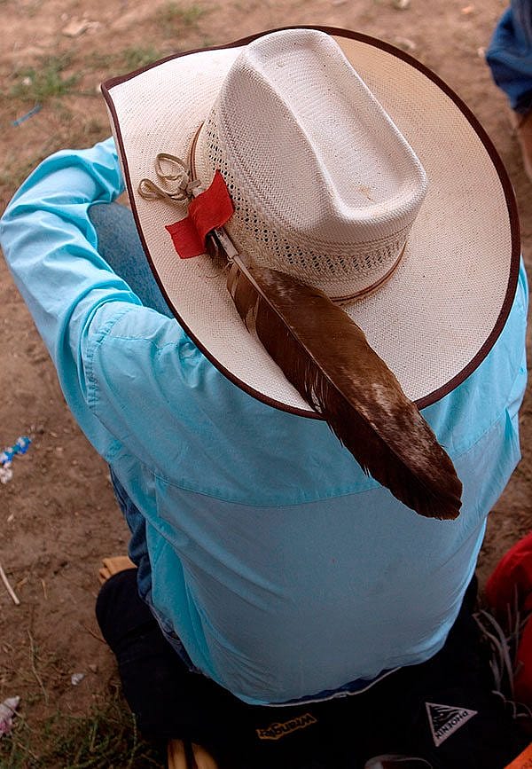 Ken Blackbird's "Indian Cowboy with eagle feather, Crow Fair, Montana, August 2009. P.426.05388