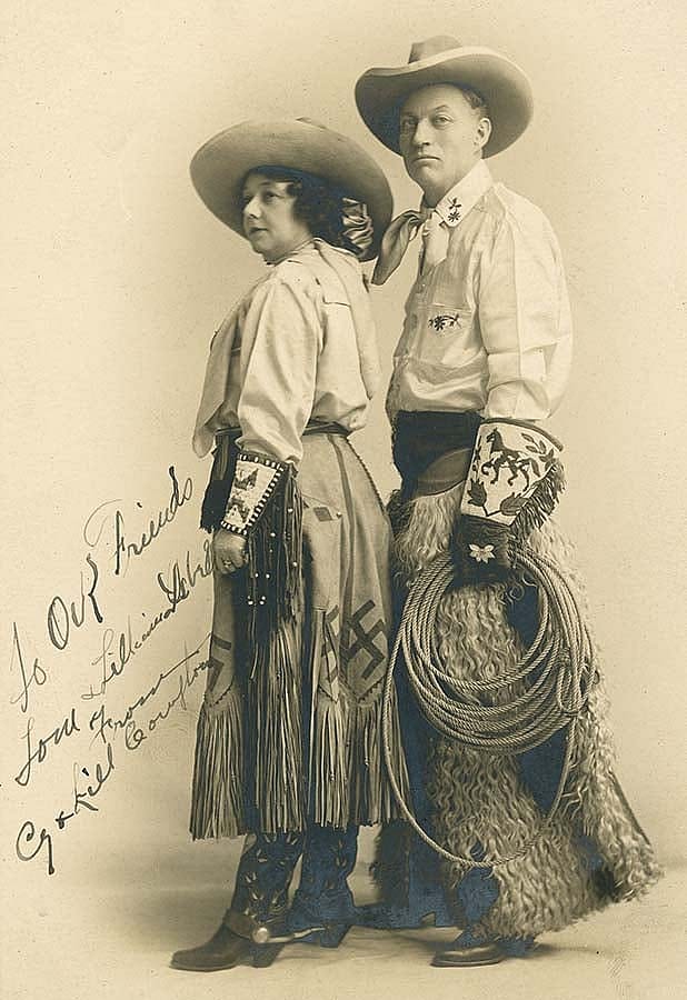 Cy and Lill Compton, ca. 1905. Note swastika on skirt and Native designs on cuffs and gauntlets. Buffalo Bill's Wild West. Gift of Thomas P. Isbell. P.69.1901