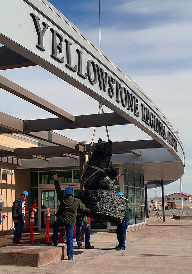 Getting close to his new pedestal at the airport.