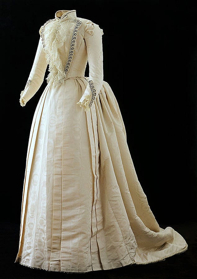 Arta Cody's ivory silk taffeta moire dress from her wedding to Horton Boal in 1889. Gift of Mr. & Mrs. Robert F. Hayden. 1.69.2041