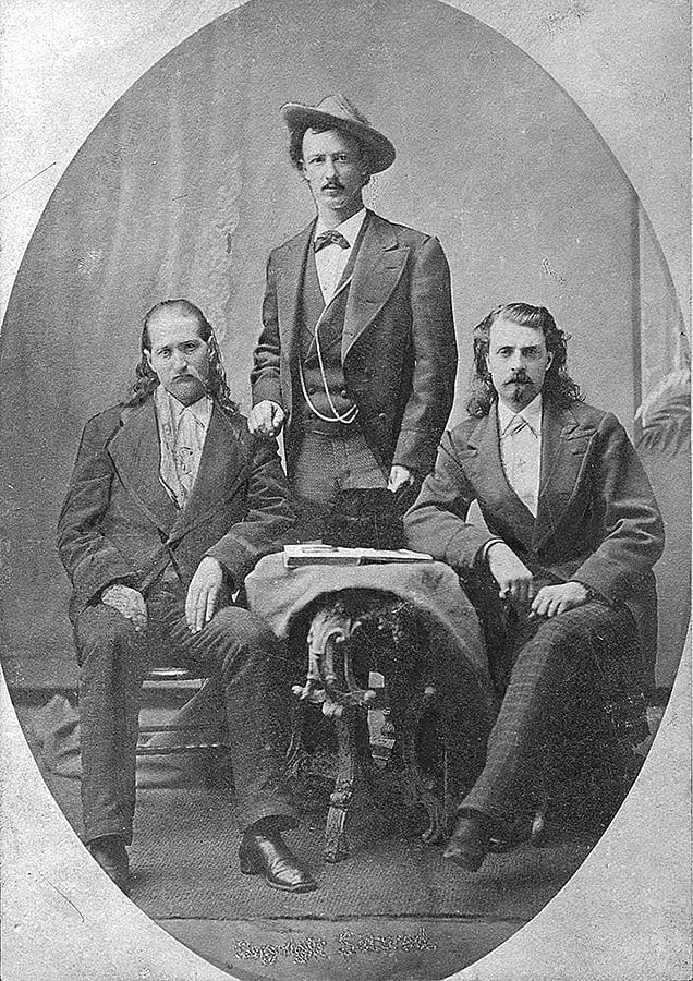 Wild Bill, Texas Jack, and Buffalo Bill. Three friends dress for the camera and pose for posterity about 1873. MS 6 William F. Cody Collection. P.69.2179