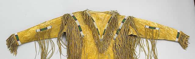 Shirt, ca. 1890. Ute, Northern Plains. Tanned deer hide, pigments, beads. Gift of Mr. J.C. Kid Nichols. NA.202.206 (detail)
