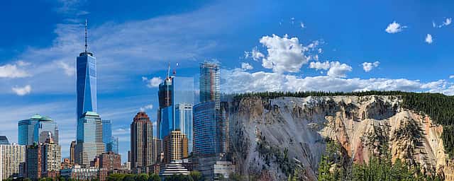 A Photoshopped image of the NYC skyline (urban skyscrapers) blending into the Wyoming skyline (mountain lanscape).