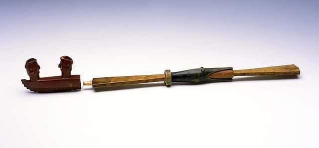 Pipe Bowl and Stem. Lakota (Sioux), Northern Plains, ca. 1865. Pipestone (catlinite), wood, pigment, brass tacks. Adolf Spohr Collection, Gift of Larry Sheerin. NA.504.125