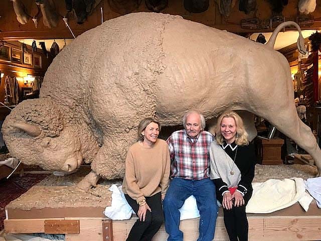 The clay model for Distant Thunder in Salt Lake City. Sculptor Michael Coleman (center) is join by Donna Poulton and Naoma Tate.