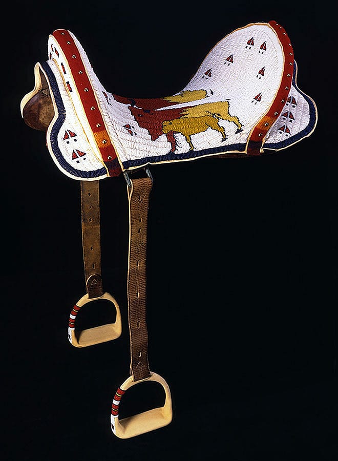 Beaded Saddle. Marcus Dewey, Inuna-ina (Northern Arapaho), Thermopolis, Wyoming, 1997. Buckskin, glass beads, wool cloth, brass tacks, McClellan saddle (U.S. Military saddle, standard issue from the Indian Wars to WWI). Gift of the Pilot Foundation. NA.403.203