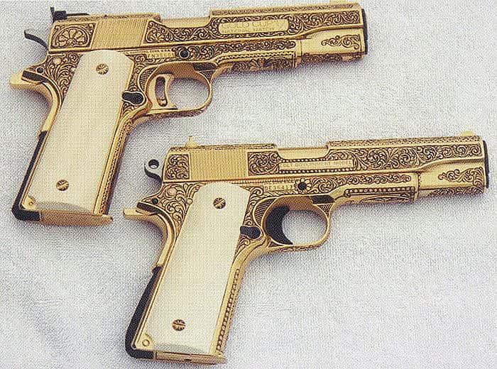 Johns engraved matched pair of gold-finished handguns. Photo courtesy of Bill Johns.