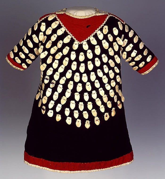 Crow dress with adornment of bone carved to look like elk teeth. Irving H. "Larry" Larom Collection. NA.202.881