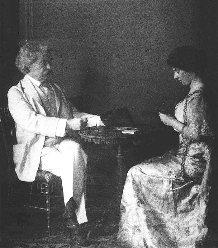 Twain playing cards with daughter Clara, ca. 1908. Photo courtesy The Mark Twain Archive, Elmira College, Elmira, New York.