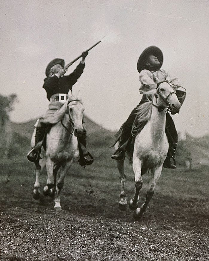 A Treasure from Our West: Photograph, Buffalo Bill shooting target balls. P.69.3
