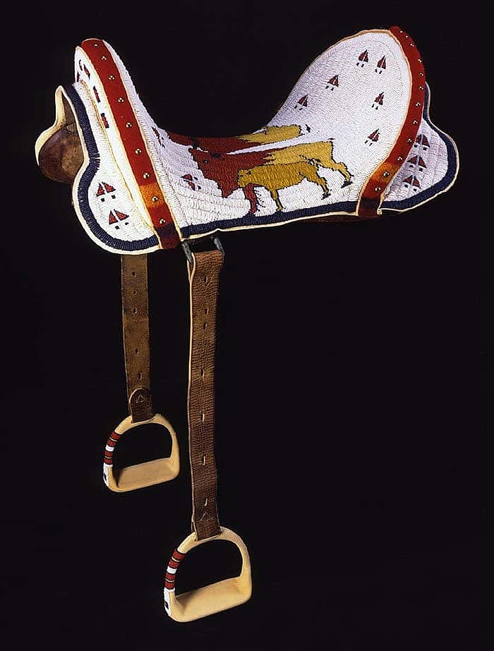 Beaded Saddle, Marcus Dewey, Northern Arapaho, Thermopolis, Wyoming, 1997. Tanned hide, glass beads, wool cloth, brass tacks, and McClellan saddle. Museum purchase with Funds provided by the Pilot Foundation. NA.403.203