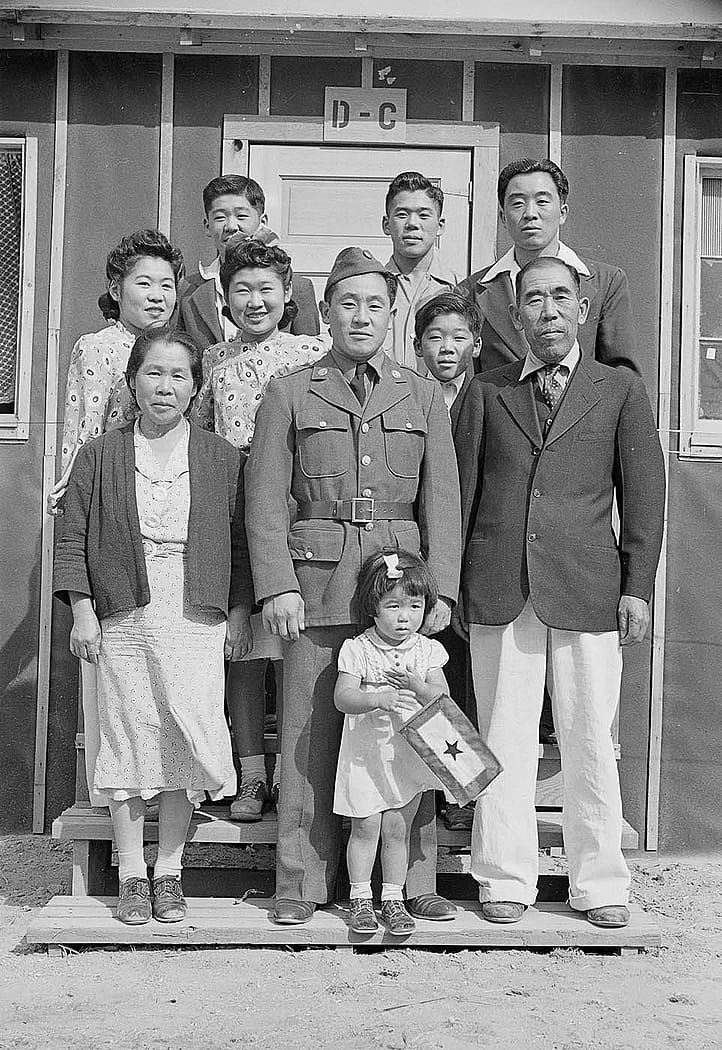 Yamano family with son on leave from the Army at Heart Mountain Relocation Center. MS 89 Jack Richard Photograph Collection, McCracken Research Library. PN89.111.21236.21no family with son on leave from the Army at Heart Mountain Relocation Center