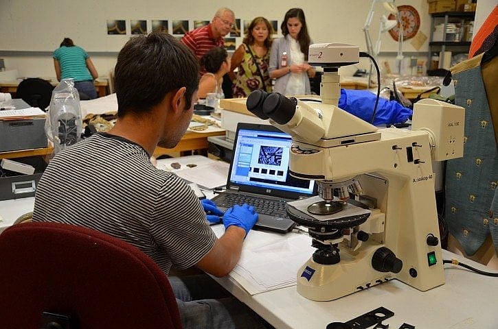 Benjamin Regel examining Peace Medals