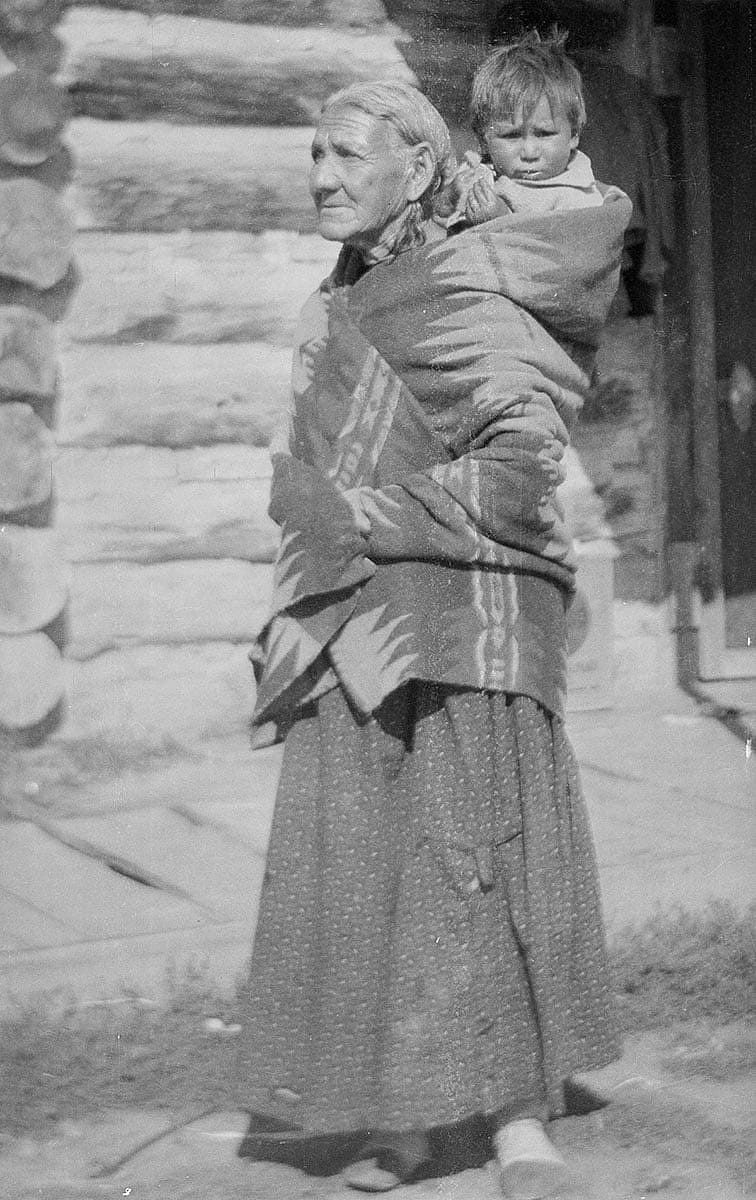Sarah Harris with young child, 1925. Northern Cheyenne. MS 165 Thomas B. Marquis Native American Nitrate Negative Collection. PN.165.1.81