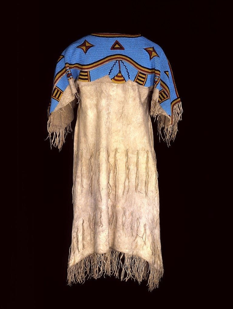 Dress, Lakota (Sioux), Northern Plains, ca. 1880. Tanned deer hide, glass beads. Chandler-Pohrt Collection, Gift of Mr. William D. Weiss. NA.202.355