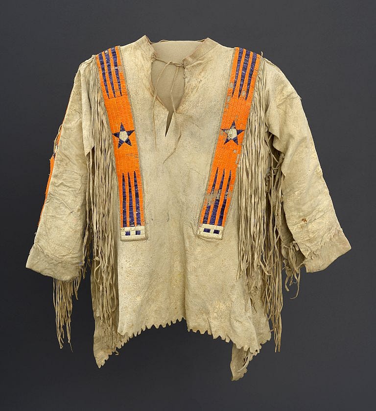Hide shirt, ca. 1890. Hiraaca (Hidatsa). The Paul Dyck Plains Indian Buffalo Culture Collection, acquired through the generosity of the Dyck family and additional gifts of the Nielson Family and the Estate of Margaret S. Coe. NA.202.1308