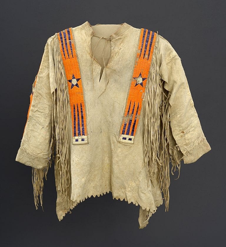 Hide shirt, ca. 1890. Hiraaca (Hidatsa). The Paul Dyck Plains Indian Buffalo Culture Collection, acquired through the generosity of the Dyck family and additional gifts of the Nielson Family and the Estate of Margaret S. Coe. NA.202.1308