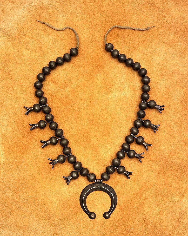 A Treasure from Our West: Squash blossom necklace. Gift of Betty Lou Sheerin. NA.203.1355