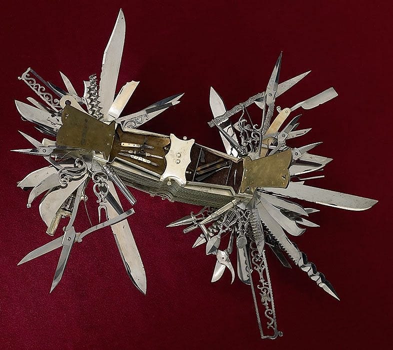 Multi-bladed folding knife with .22 caliber pistol, made by the John S. Holler Company for display. L.373.2012.5