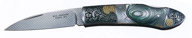 Folding art knife. Photo courtesy of Bill Ankrom. Engraving by Gil Rudolph.