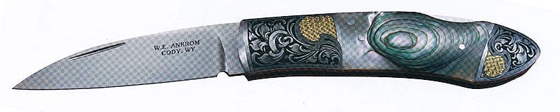 Folding art knife. Photo courtesy of Bill Ankrom. Engraving by Gil Rudolph.