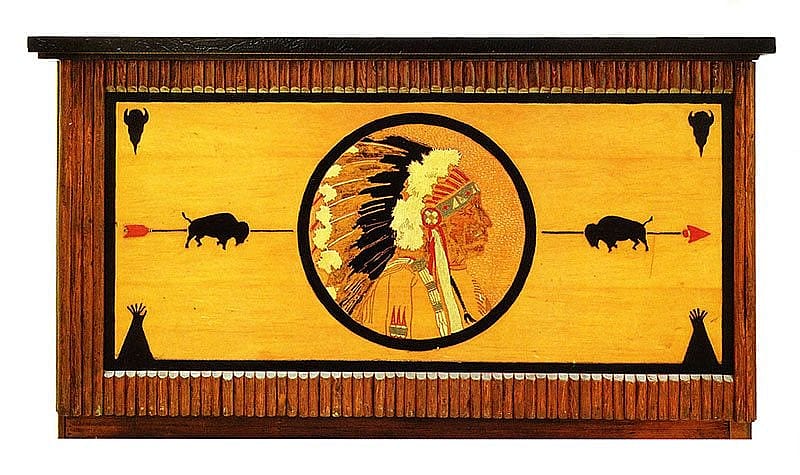 Indian head bar. While both have been converted to portable bars and partially refinished, the striking "dollar bill" design remains. Collection of Blair's Holiday Inn.