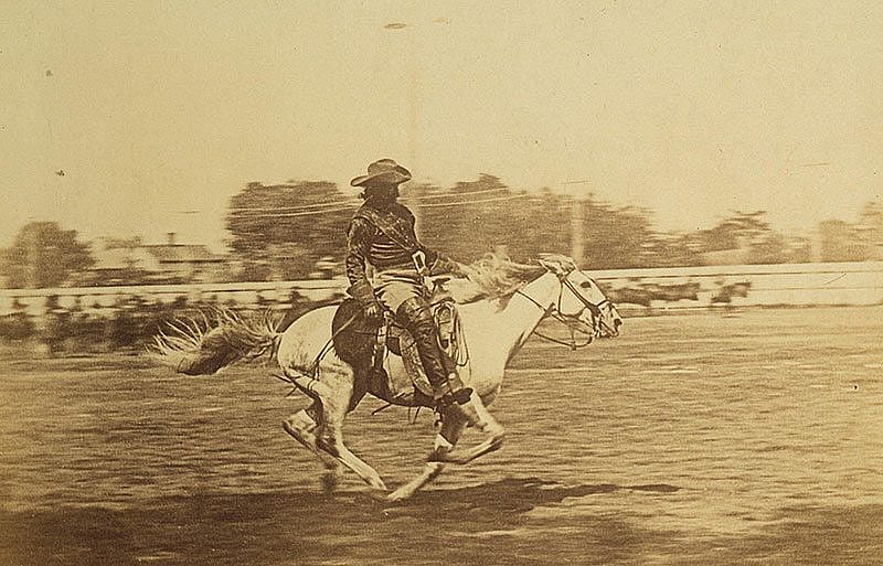 Cody liked riding at full speed. In this undated photo, he races his horse in an arena. MS 71 Vincent Mercaldo Collection, McCracken Research Library. P.71.40.1