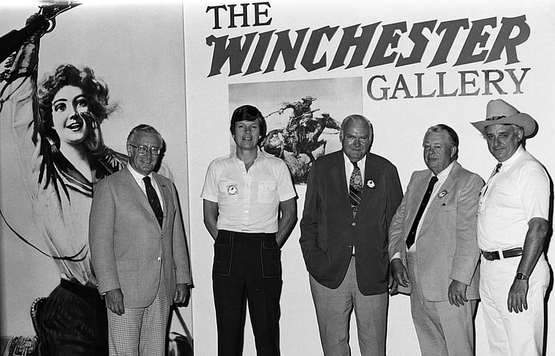 Pictured at the entrance to the Winchester Gallery, July 4, 1976, are (L-R) John Henske, CEO, Olin Corporation; Dick Pelton, Winchester Vice President of Marketing; Phil Richey, Winchester President; William Talley, Center Trustee and retired Winchester executive; and Curt Gowdy, Center Trustee and ABC Sportscaster. P.20.4653