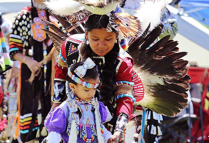 Archuleta siblings, sister Taylor Archuleta 3 yrs and brother Darrian Archuleta 11 yrs, Pueblo/Southern Ute. Teen boy's traditional and tiny tot jingle dress dancers from Albuquerque, NM. ©2019 Photo by Frontier Fortitude.