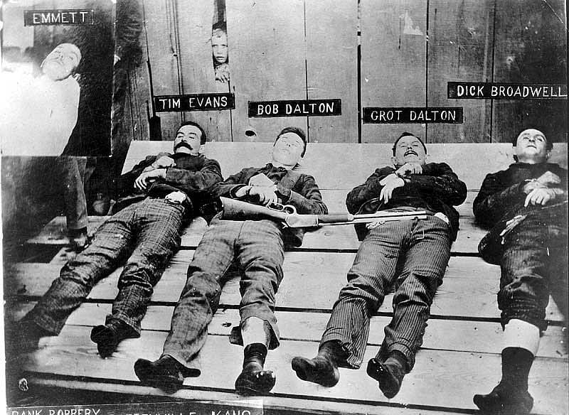 The Dalton Gang, deceased bodies on display in Coffeyville, Kansas, following their ill-fated attempt to rob two banks there simultaneously on October 5, 1892. MS 71 Vincent Mercaldo Collection. P.71.1166