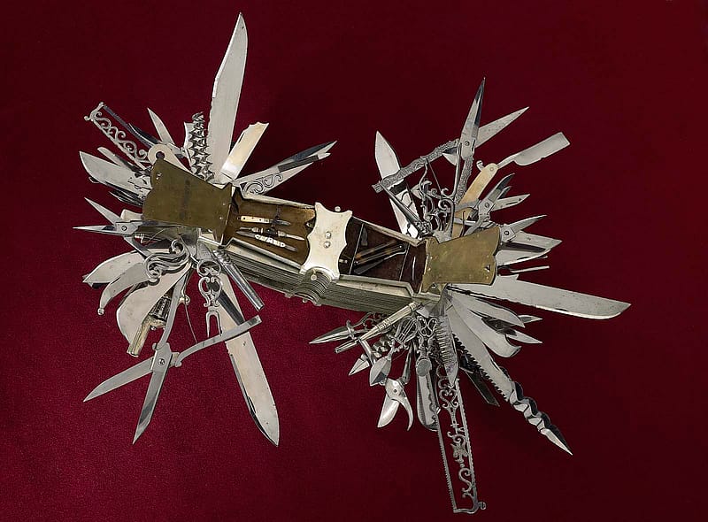 In this view, tortoise shell handle covers are open to reveal the miniature tools contained in the compartments. Multi-bladed folding knife made in Germany ca. 1880 for John S. Holler, cutlery merchant, New York City 1867-1906. Cat. No. 1986.0101.03