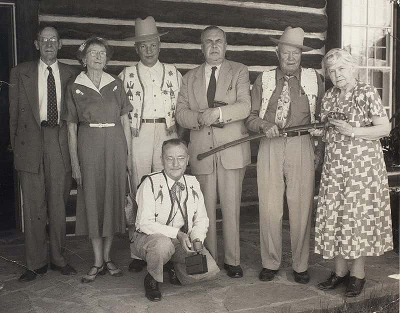 Cody family members as well as the general public donated materials to the Buffalo Bill Museum. Here, Harvey P. Cody presents Ned Buntline's Civil War sword to Mary Jester Allen at the 1953 Cody Family Reunion. Present are, left to right, Dr. and Mrs. Frank McClanahan, Hiram S. Cody, Ernest W. Cody, Harvey P. Cody, Mary Jester Allen, and Joe Hufford (kneeling). Jack Richard Photo. Mary Jester Allen Collection. P.41.501