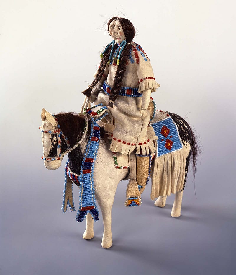 Northern Plains doll and horse, ca. 1900. Constructed of cloth, tanned deer hide, beads, horse hair, and pigment. Gift of Ms. Lucile M. Wright. NA.507.18