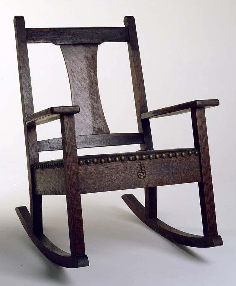 Sharp's oak Roycroft rocking chair with a leather padded seat, ca. 1905. Height 30 inches. 19.00.92