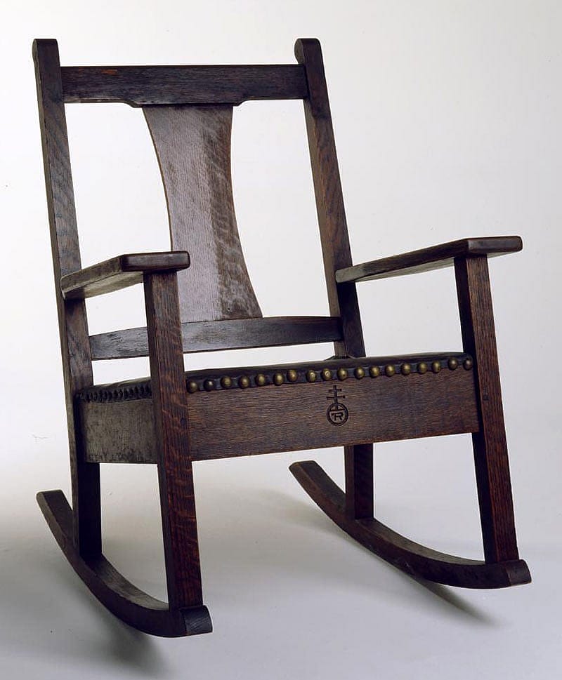 Sharp's oak Roycroft rocking chair with a leather padded seat, ca. 1905. Height 30 inches. 19.00.92