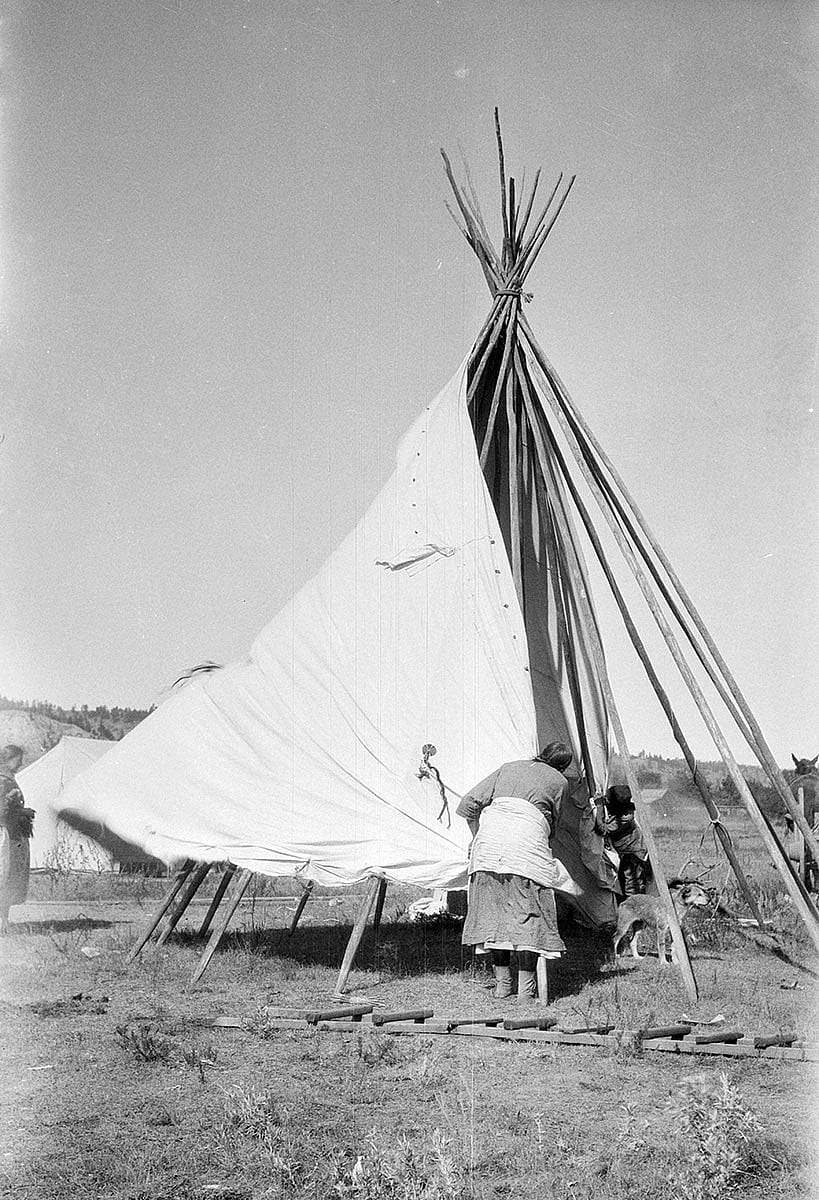 Two Cheyenne women setting up tipi, ca. 1922-1935. MS 165 Thomas B. Marquis Collection. PN.165.1.170