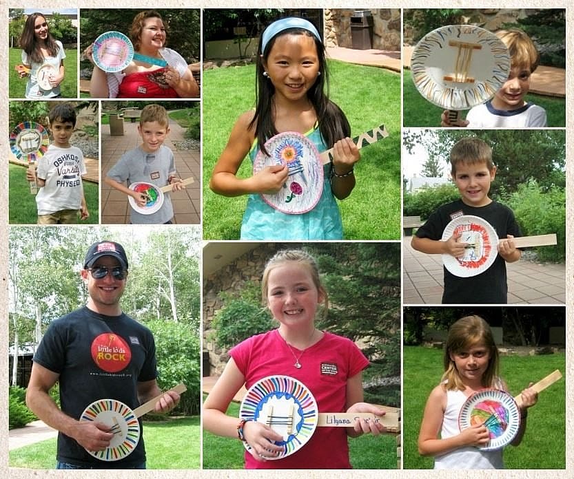 Collage of diverse individuals proudly displaying their DIY paper plate banjos, each uniquely decorated, at an outdoor craft event.