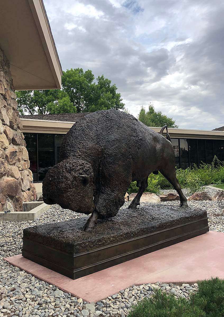The sculpture's new home to the right of the Center's front entrance. Michael Coleman (b. 1946). Distant Thunder, 2019. Bronze, 7.5 x 10.4 feet; 3,000 pounds. Gift of Naoma Tate and the Family of Hal Tate.