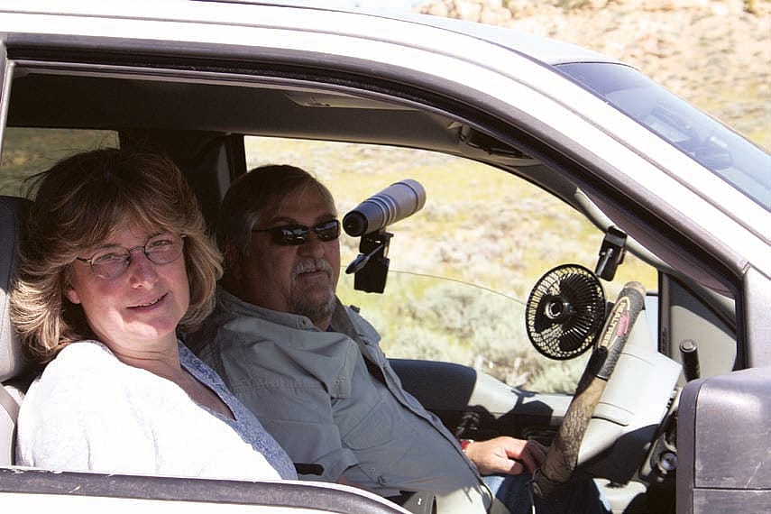 Posse members Dale (foreground) and Bud Schrickling keep cool while monitoring their adopted nest.
