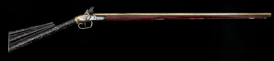 Lukens air rifle. Since Lukens was one of the most prominent American air rifle makers of the day and his estate listed an air rifle claimed to have been used by the expedition many people believed his rifle was the type carried on the journey. The buttstock serves as the air reservoir, but the rifle has no magazine and each projectile must be loaded from the muzzle. Gift of Thomas K. Hutchinson. 1993.8.103