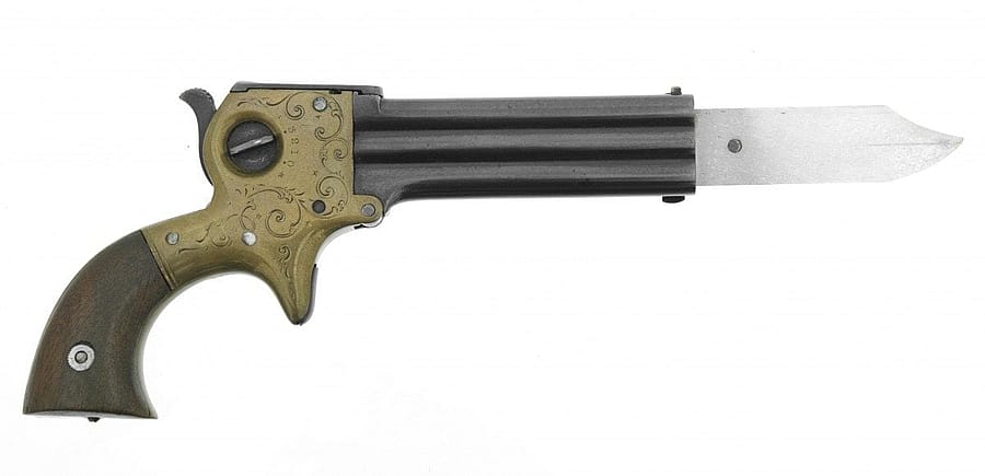 Marston Three-Barrel Derringer, Retractable Knife Blade Model, .22 rimfire. Gift of Olin Corporation, Winchester Arms Collection, 1988.8.71