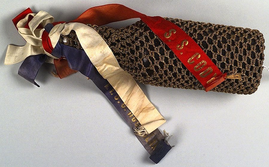 A Treasure from Our West: Ship-christening champagne bottle. Museum Purchase, Garlow Collection. 1.69.180b