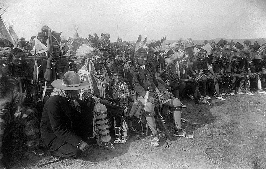 "Plenty Coos." This image of Chief Plenty Coups (marked with an "x" by photographer) is present in a photograph album kept by Crow Reservation agent Edward Becker, containing Fred E. Miller prints. MS 32 Edward Becker Collection. P.32.6