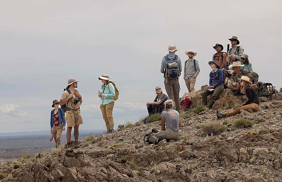 Participants take a break at the top of a ridge during the Birdseye Pass Hike as part of the Wyoming Native Plant Society's 2022 Wildflower Weekend which was based in Thermopolis. 