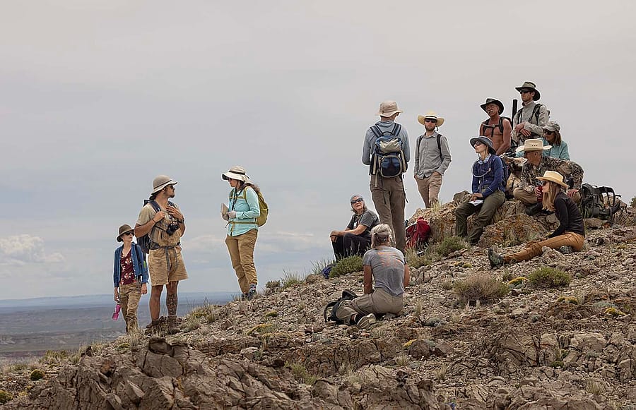 Participants take a break at the top of a ridge during the Birdseye Pass Hike as part of the Wyoming Native Plant Society's 2022 Wildflower Weekend which was based in Thermopolis.