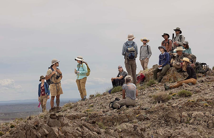 Participants take a break at the top of a ridge during the Birdseye Pass Hike as part of the Wyoming Native Plant Society's 2022 Wildflower Weekend which was based in Thermopolis.