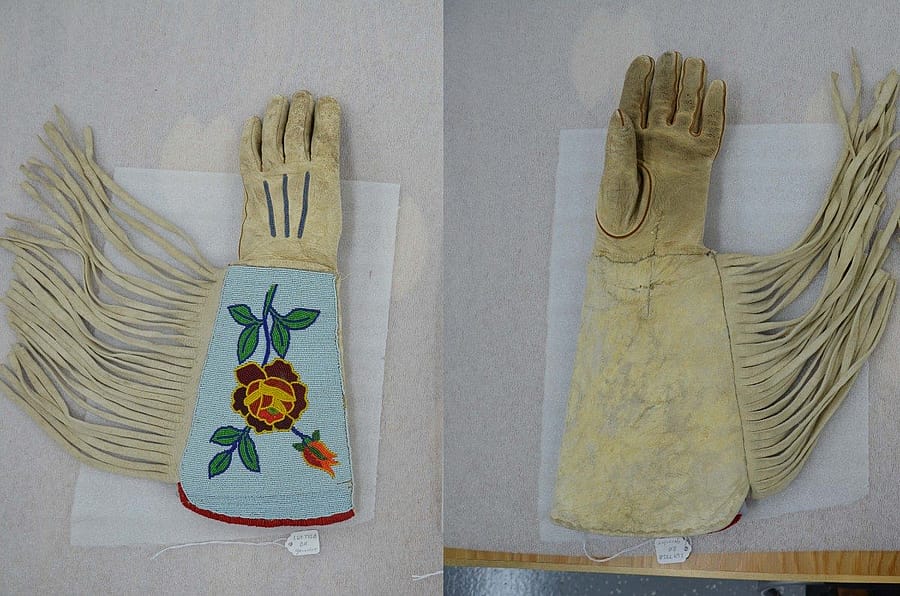 One of a pair of gauntlets displaying Crow beadwork (left). Same gauntlet displaying palm (right). Acc # 1.69.775