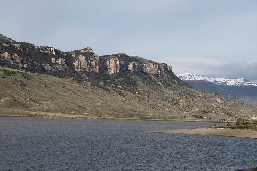 One of the Greater Yellowstone Raptor Experience study nests sits high on this cliff above Buffalo Bill Reservoir