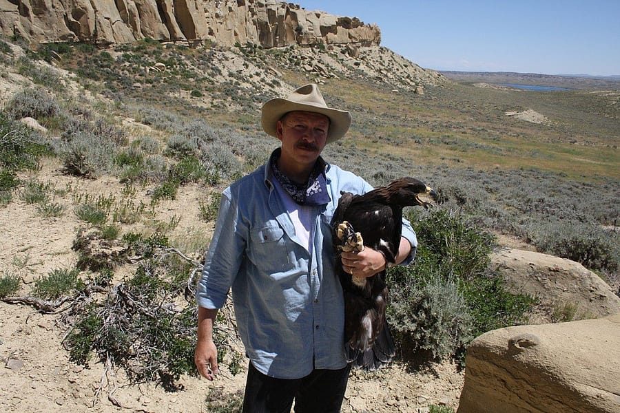 Dr. Preston with recently captured and banded juvenile eagle. Photo by R. Jones