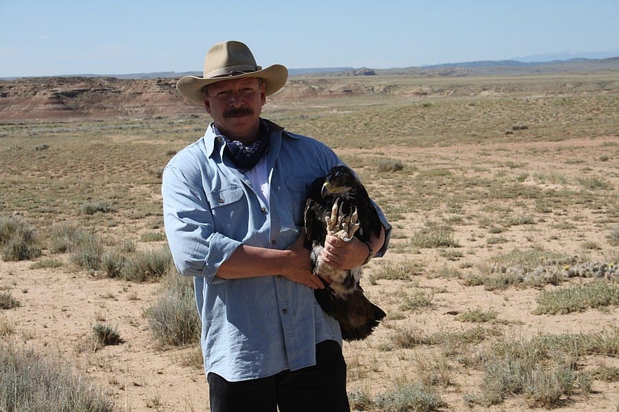 Dr. Preston preparing to band a nestling. photo by P. McClinton